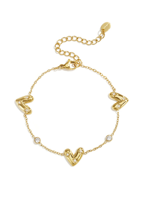 Armband Met Drie Belegde Harten En Ronde Zirkonia Steentjes