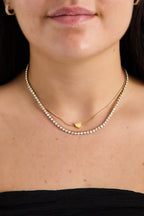 Elegante Gouden Ketting Met Gelaagde Hartjes
