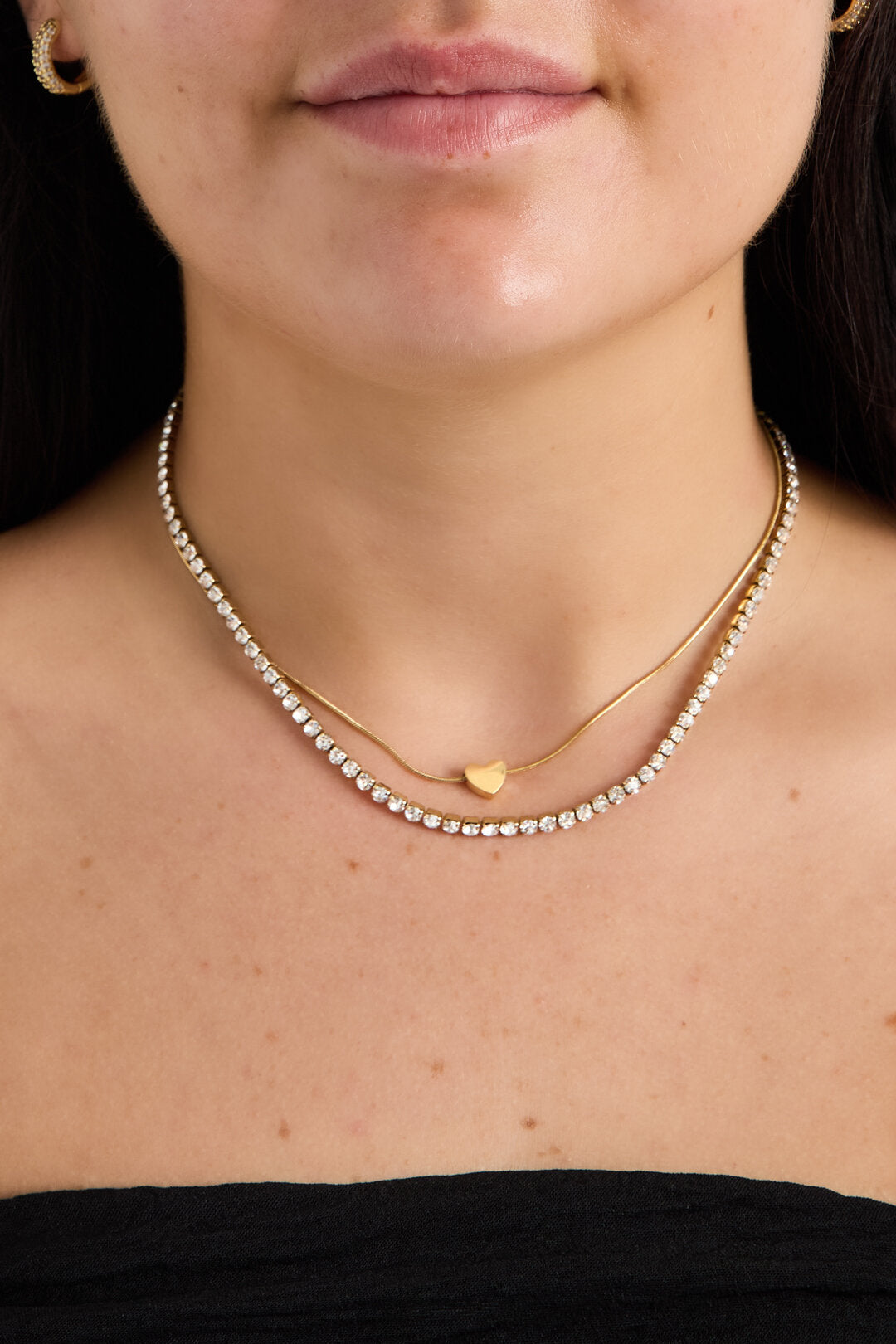 Elegante Gouden Ketting Met Gelaagde Hartjes